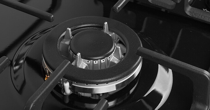 Lady cleaning the fridge.